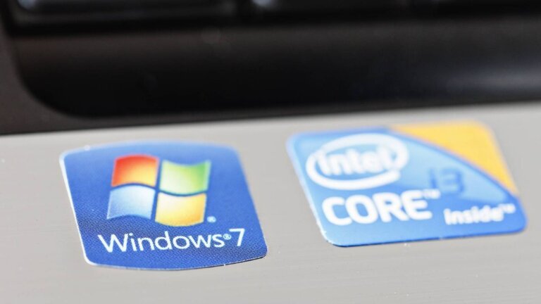 Turns out that the earliest versions of Windows 7 took longer to load depending on your choice of desktop wallpaper