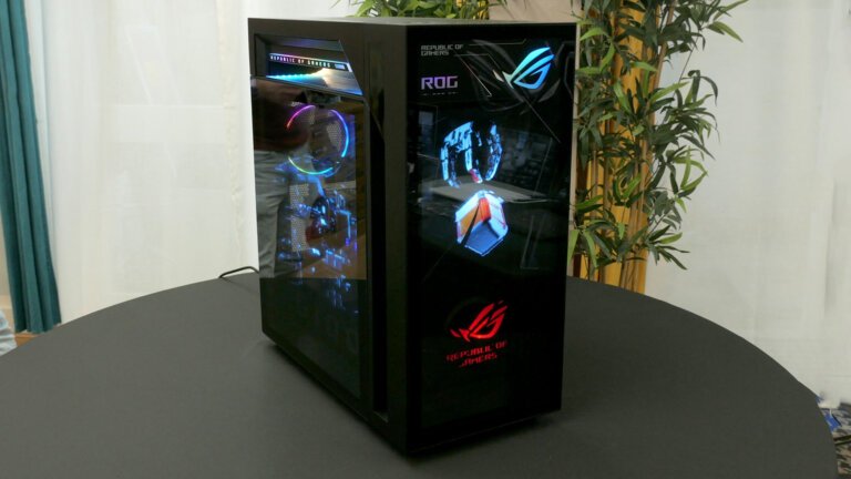 Asus' colossal new gaming PC has a two-inch-thick door, holographic fans, and a hood scoop