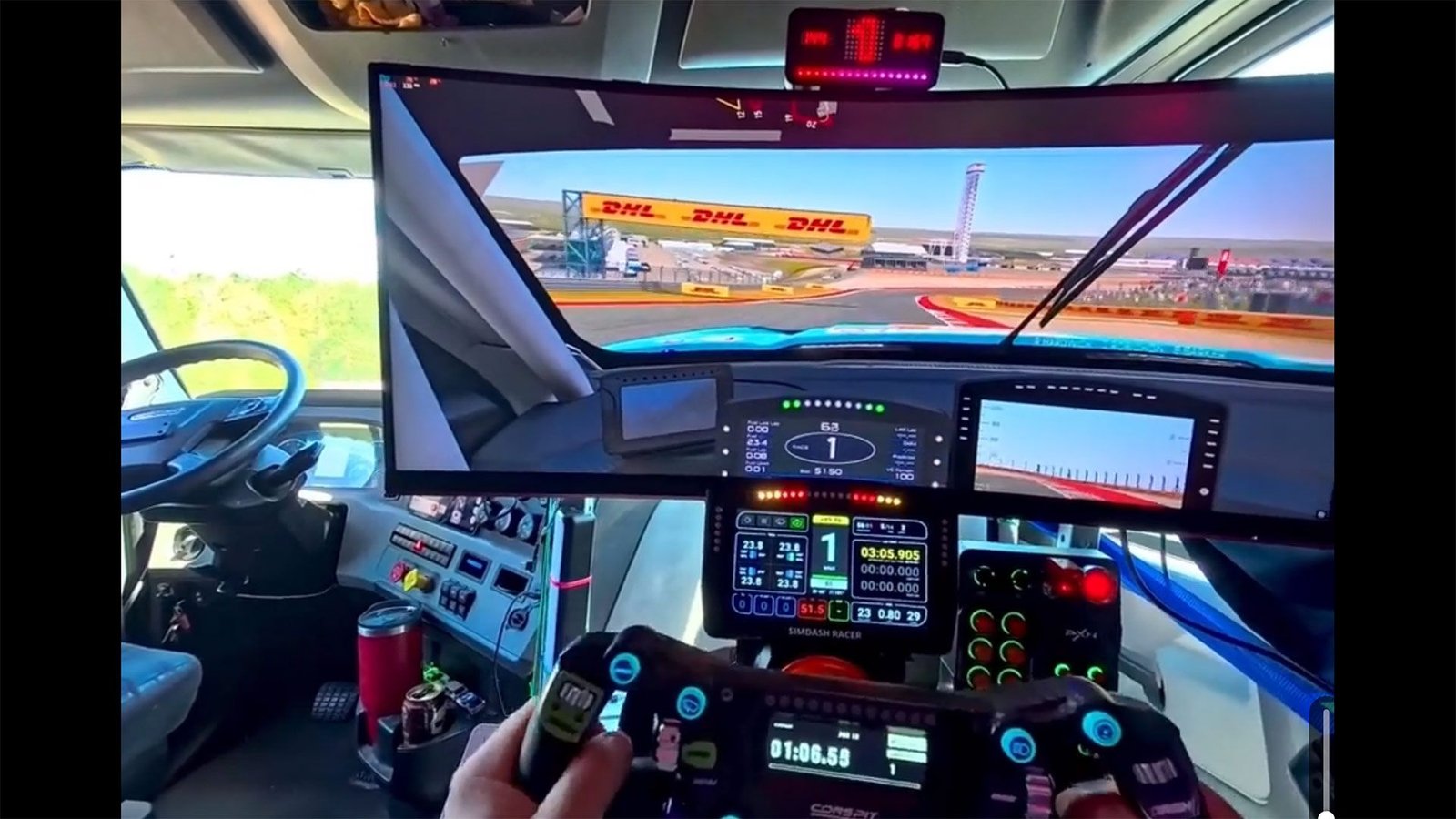 Trucker shows off $6,000 PC driving sim rig in passenger seat — driver slides over to RTX 5080-powered setup when stuck in traffic